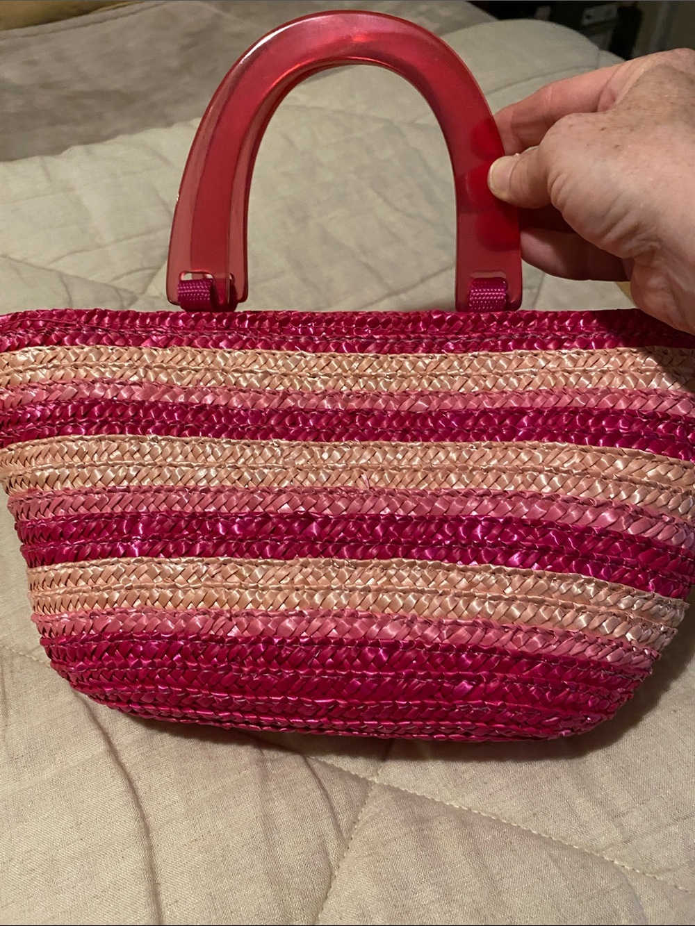 Pink straw purse with plastic handles